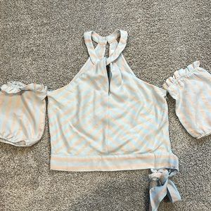 Adorable light blue and pink blouse.